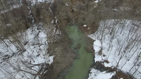 Impressive drone view of landslide in spring in a river valley - 24fps 1080p Stock Footage 104069967
