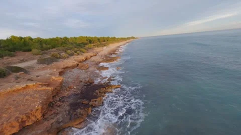 Impressive fast drone flight above a beautiful rocky coastline Stock Footage 260726964