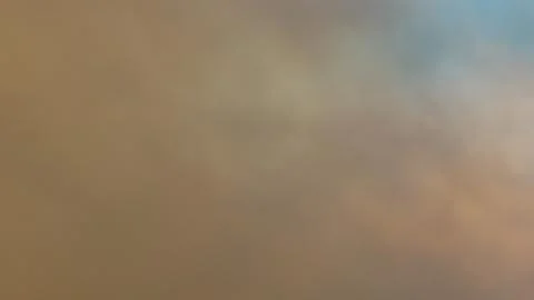 Impressive fire and smoke clouds. Stock Photos