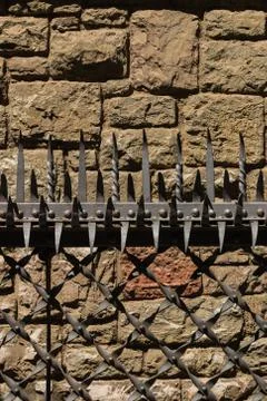 Impressive forged  tines in a protective security barrier Stock Photos