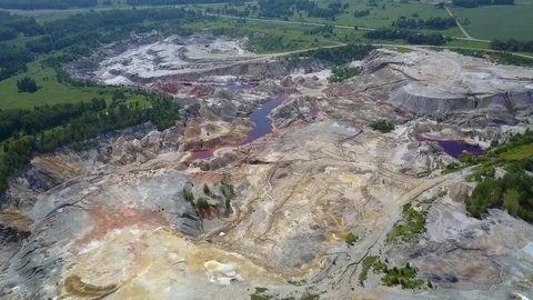 Impressive high flight over clay pit territory with pond 스톡 동영상 94692531