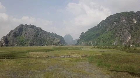 Impressive landscapes with mountains, lake and plants in Ninh Binh in Vietnam Stock Footage 123712894