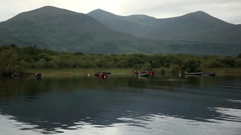 Impressive mountain reflection on lake water with calm ripples Stock Footage 45124222