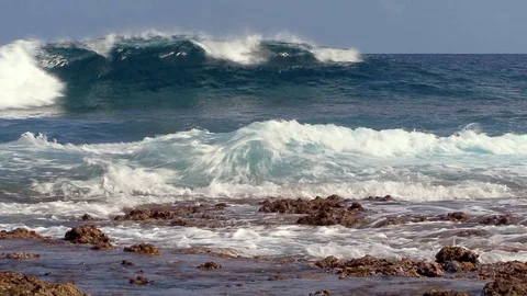 Impressive oceanic waves  breaking on the coral shelf of an atoll1 Stock Footage 108040942