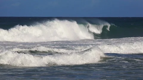 Impressive oceanic waves  breaking on the shore of a small island Stock Footage 108040560