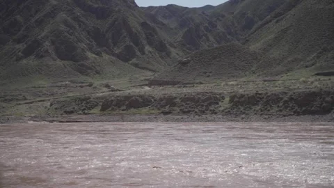 Impressive Real Capture of River Flowing Near Mountain Range Stock Footage 319609449