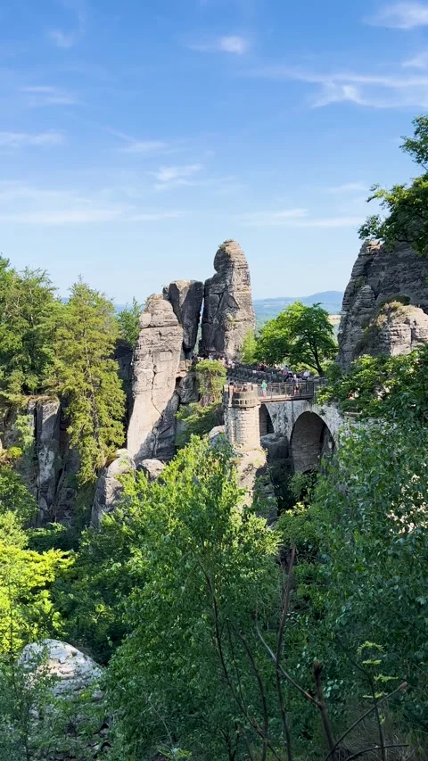 Impressive rock formations next to an ancient bridge Stock Footage 303894414
