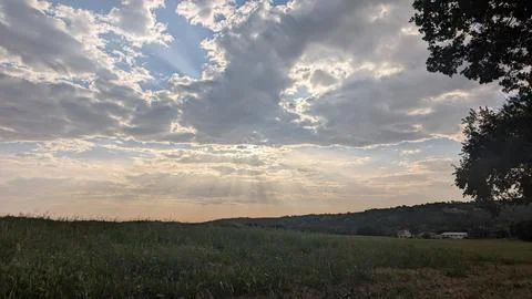 Impressive rural landscape with sun rays Stock Photos