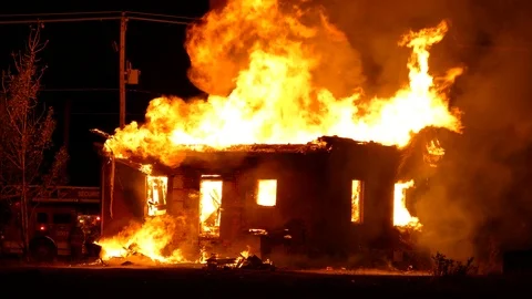 Impressive shot of a violent house fire in an abandoned rural setting Stock Footage 115013639