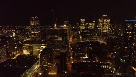 Impressive slow drone flight in city core showing pretty nightscape Video stock 121540741
