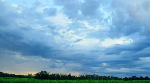 Impressive summer landscape over fields and dark blue sky. Time lapse. Stock Footage 51961449