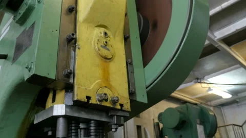 An impressive view of a big flywheel rotating in a workshop at a plant. Stock Footage 87783886