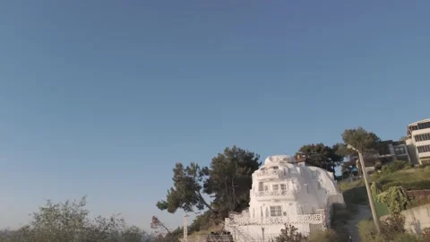 Impressive view of a large house on beach at beautiful sunset Stock Footage 311113366