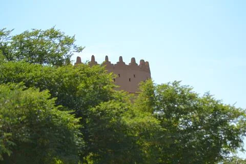 Impressive view of the mud-brick buildings and trees of Ait Benhaddou Stock Photos
