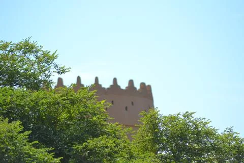 Impressive view of the mud-brick buildings and trees of Ait Benhaddou Stock Photos