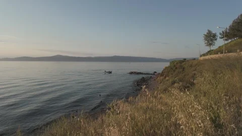 Impressive view of sea waves of Mudanya with a beautiful sunset Stock Footage 311114547