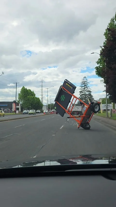 Improperly Secured Construction Sign Rolls Into Traffic, Vancouver, Washington,  Stock Footage 337547433