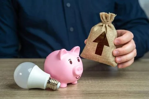 Improve energy conservation methods and save on electricity bills. Offerin... Stock-Fotos