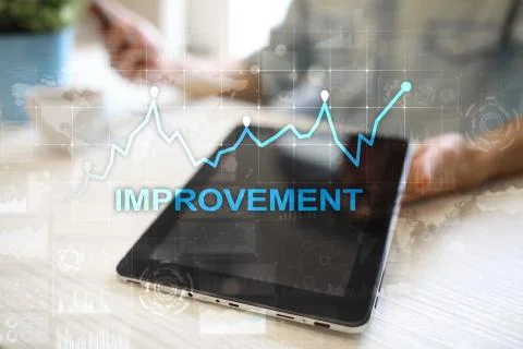 Improvement graph on virtual screen. Business and technology concept. 库存照片