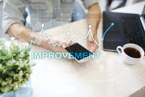 Improvement graph on virtual screen. Business and technology concept. 스톡 사진