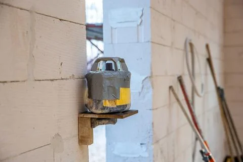 Improvised Device and Tools in a Workshop Setting with Brick Wall Stock Photos