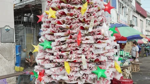 Improvised xmas tree made out of plastic sacks, Cebu, Philippines Stock Footage 226711790