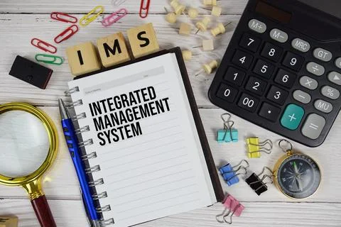 IMS - Integrated Management System acronym on notepad, business and financi.. Foto stock