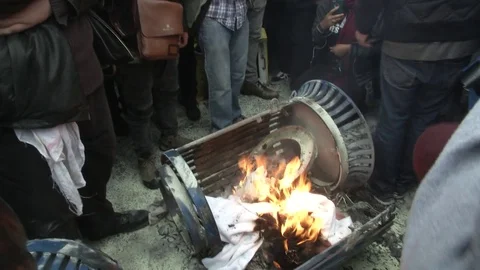 Inaugural Protesters Feed a Fire Stock Footage 71801358