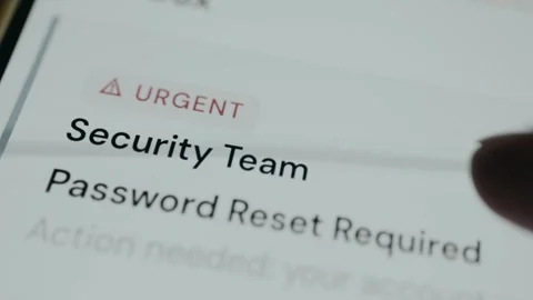 Inbox message requesting an Urgent password reset, phishing attempt. Ethical Stock Footage 333381159