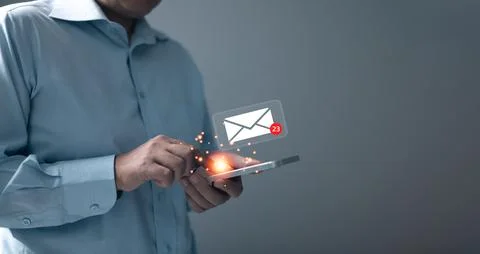 Inbox receiving electronic message alert. Business people touch on email in.. Stock Photos