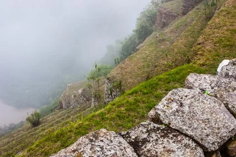 Inca architecture on a cliff. Stock Photos