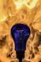The incandescence bulb (lamp) close up view by fire background Photo