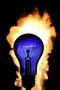 The incandescence bulb (lamp) close up view by fire background Photo