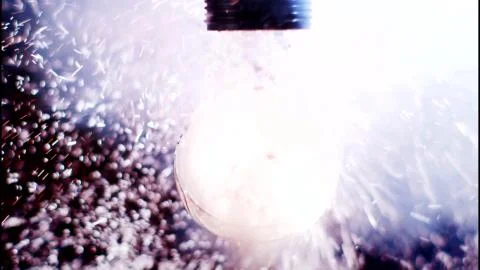 Incandescent bulb explosion while burning Stock Photos