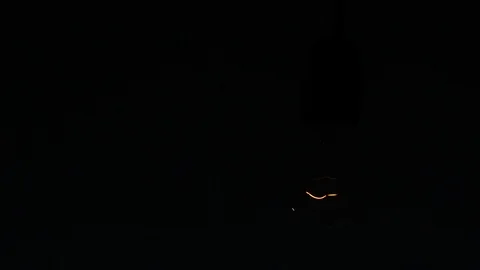 Incandescent bulb that varies the intensity of light Stock Footage 93716098