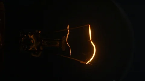 Incandescent bulb that varies the intensity of light Stock Footage 93716099