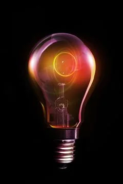 Incandescent light bulb glowing in flat design with transparent glass envelope Illustration