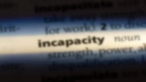 Incapacity word in a dictionary. Stock Footage 99561018