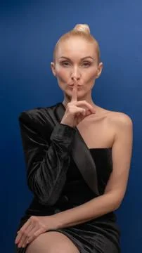 Incendiary, young, oversized posing on camera, in a dark jacket with a European Stock Photos