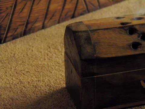 Incense box on a rustic table. Stock Photos