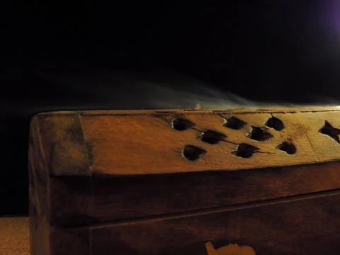 Incense box on a rustic table. Stock Photos