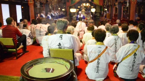 Incense burning at Buddhist temple service, Japan, Zentsu-ji Stock Footage 86758997