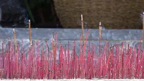 Incense burning in a Buddhist temple. zoom Stock Footage 101540345