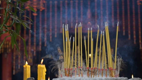 Incense burns in the temple Stock Footage 98086135