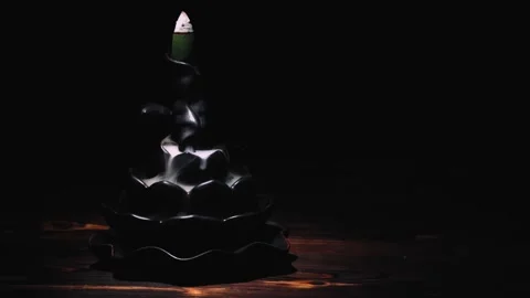 Incense cones holder. Backflow incense burner in the form of lotus flower. Video stock 152257277