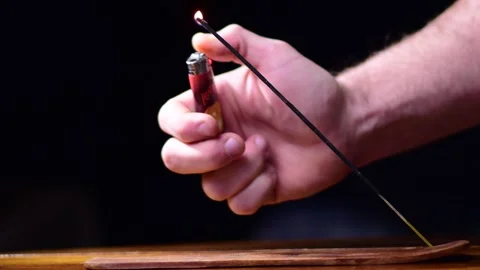 Incense lighter dark background Stock Footage 257939854