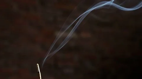 Incense smoke with brick wall in background Stock Footage 63314421