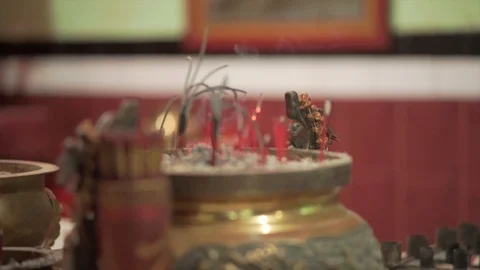 Incense Stick in Buddhist Temple next to the prayer altar of Bodhisattva 4K H Stock Footage 99333904