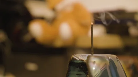 Incense stick burning Stock Footage 123870202