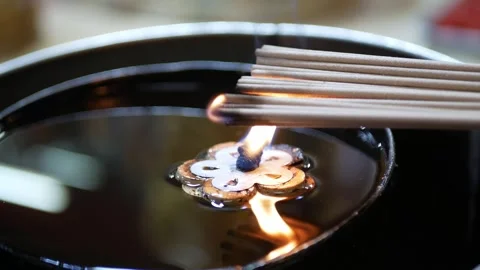 Incense stick light up with fire in Macro close up style, lighter fire and .. Stock Footage 243996649